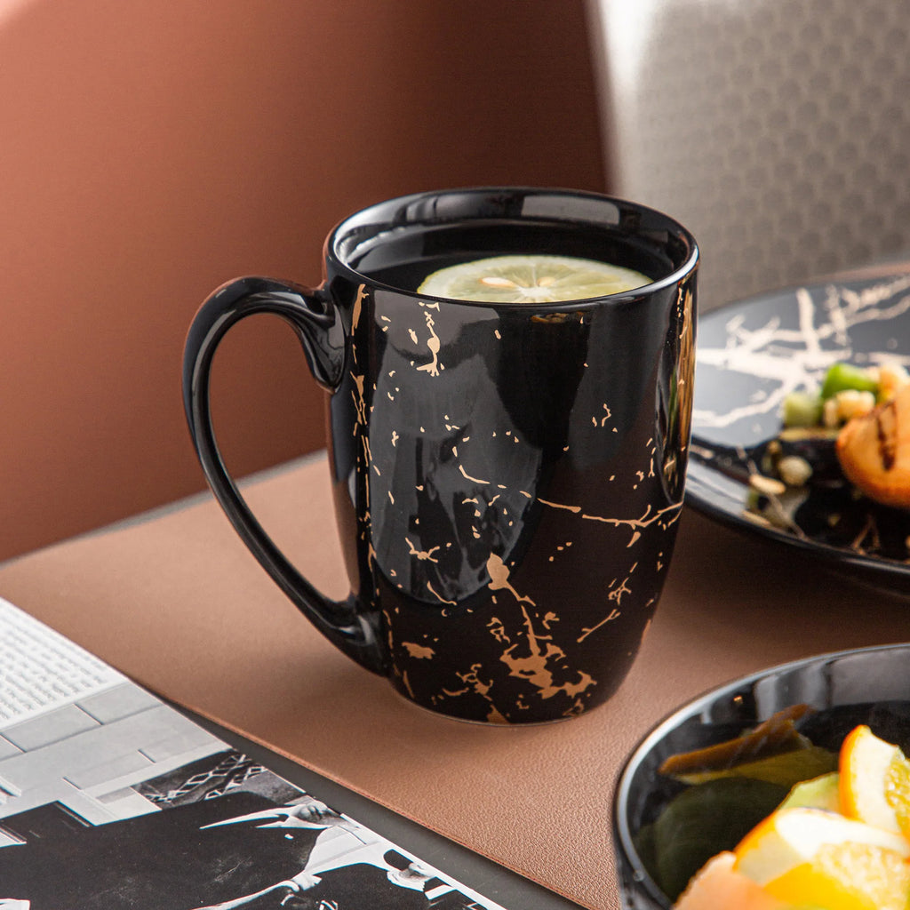 Black Porcelain Dinnerware Set with Gold Splash Design