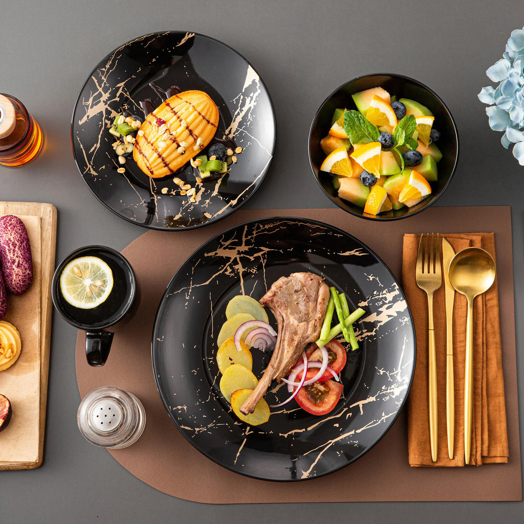 Black Porcelain Dinnerware Set with Gold Splash Design